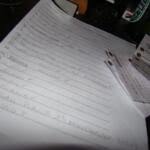 Sheet of paper with numbers down the left side and answers written next to each number